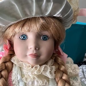 Porcelain Doll, with Satin Dress, and Hat.